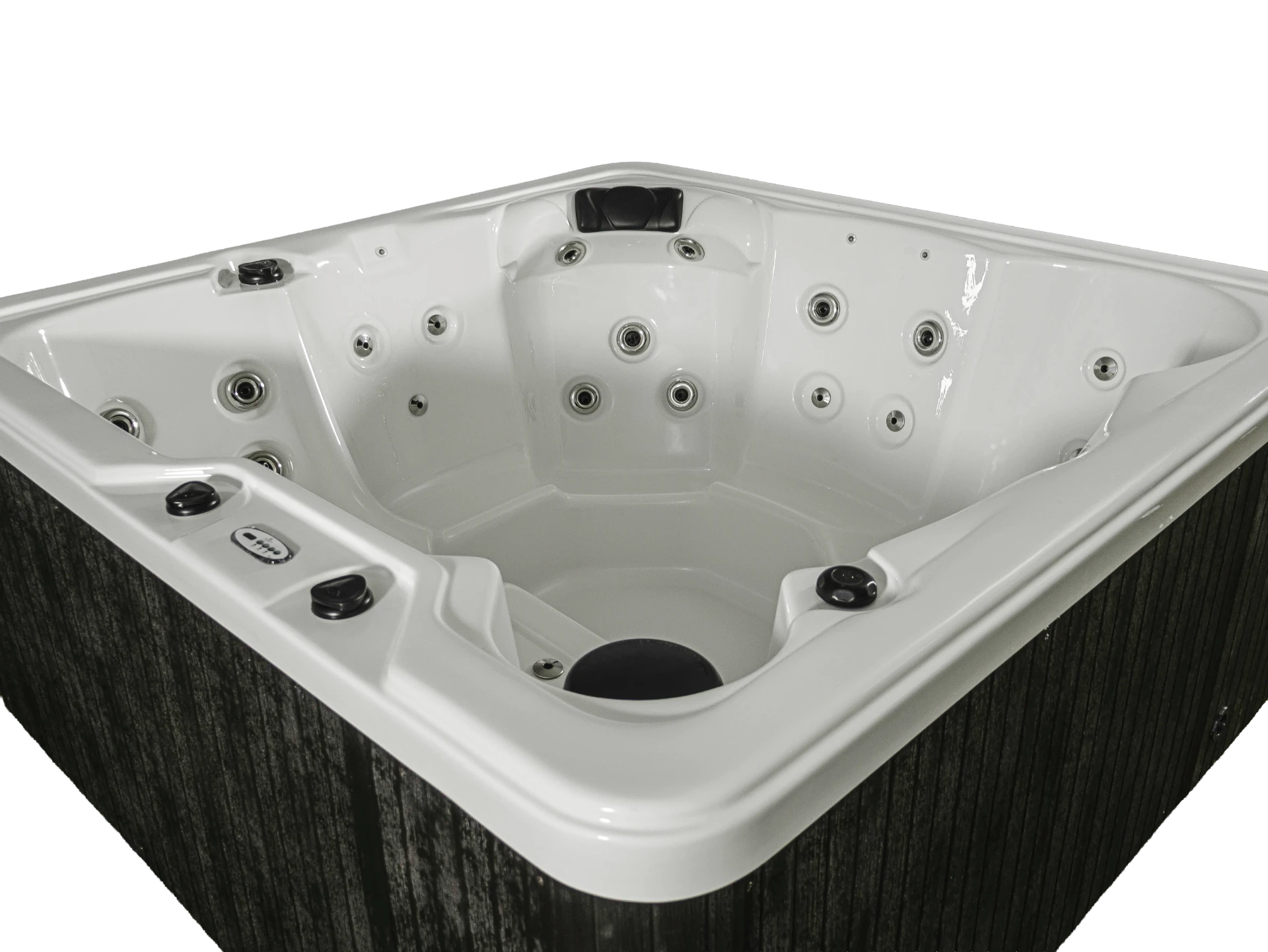 Angled view into a Hydro Spas HYD-34 Sanctuary Series hot tub showing its white shell, seats, and jets